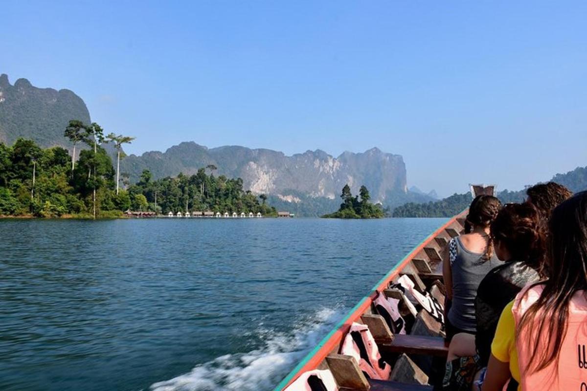 a group of people riding on a boat on the water