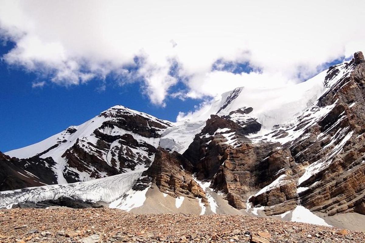 a view of a mountain with snow on it