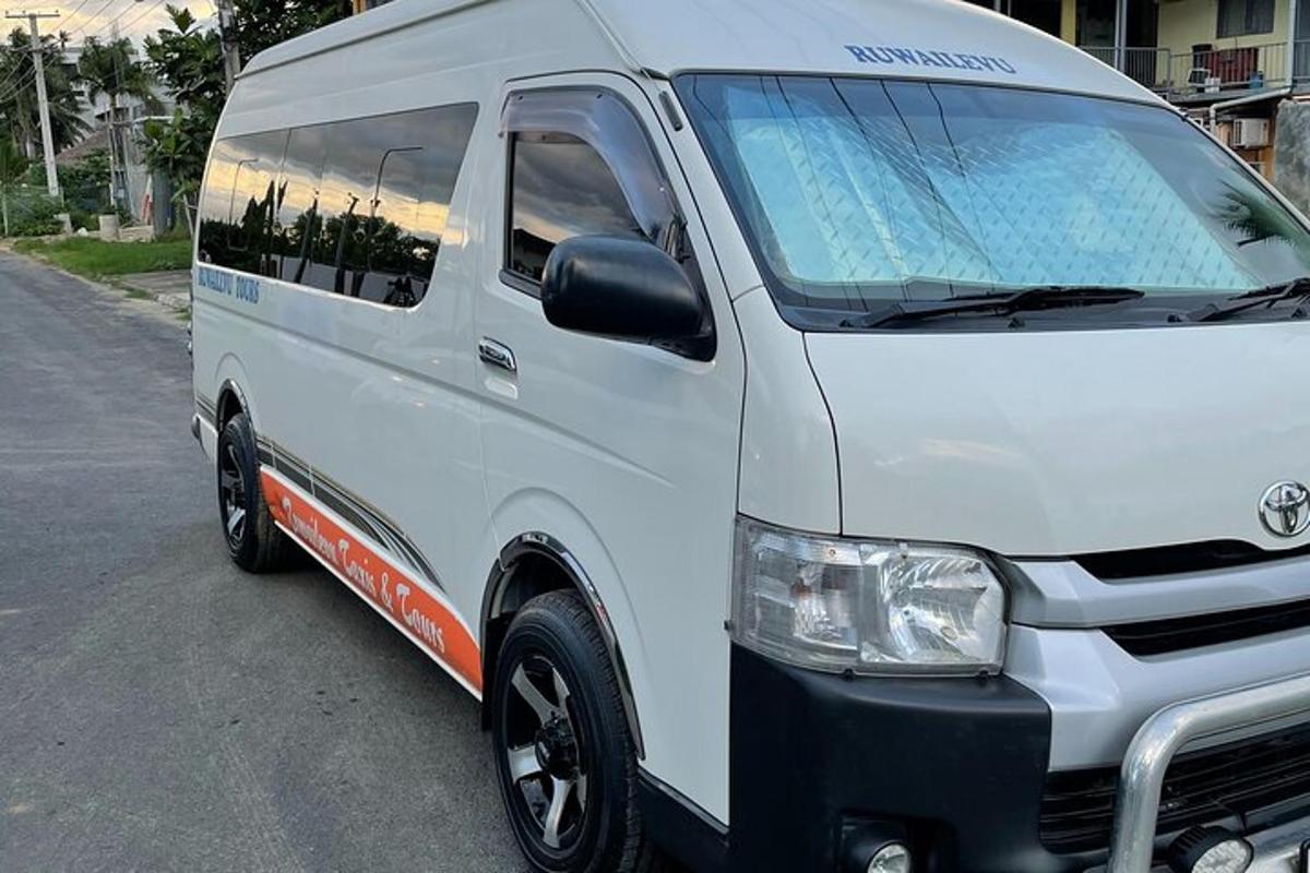 a white van parked on the side of a street
