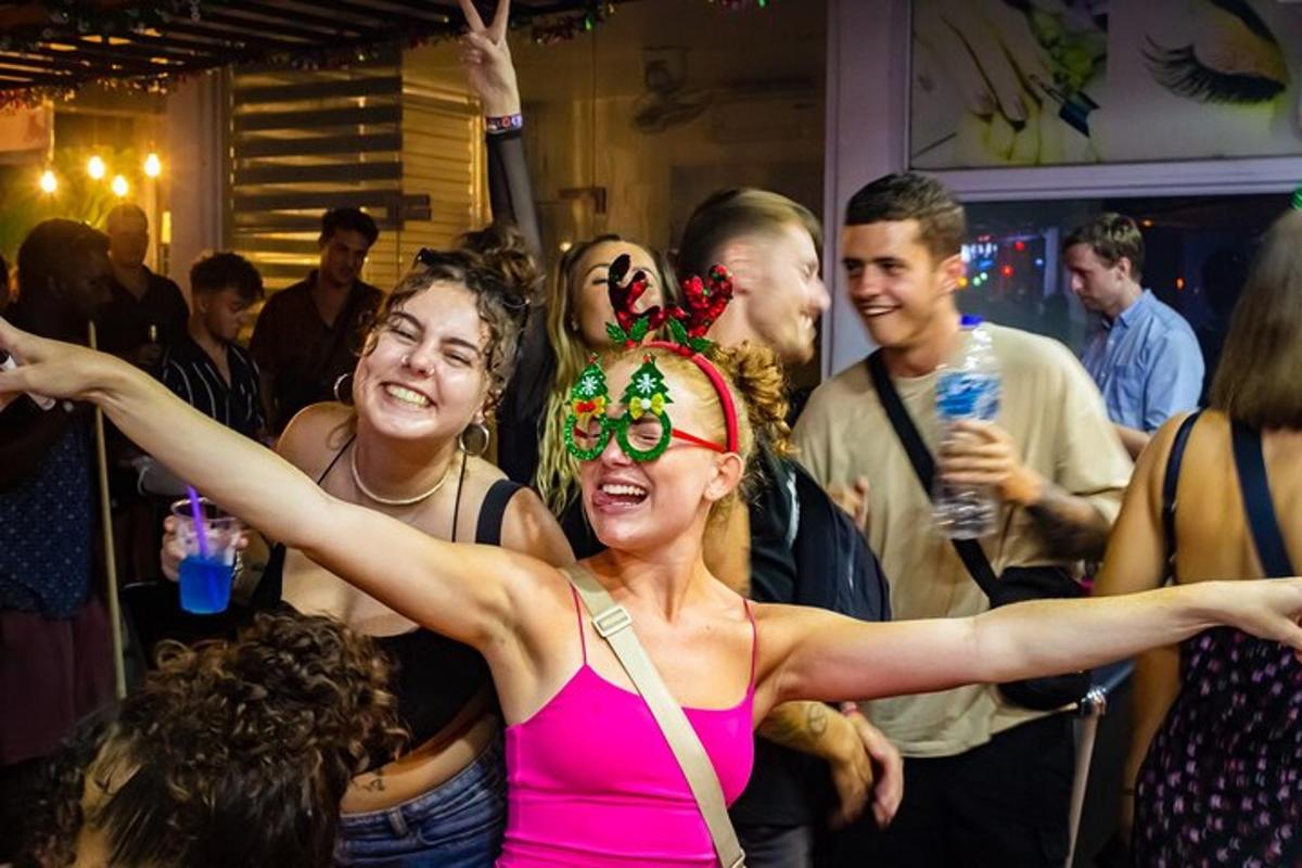 a group of people dancing at a party