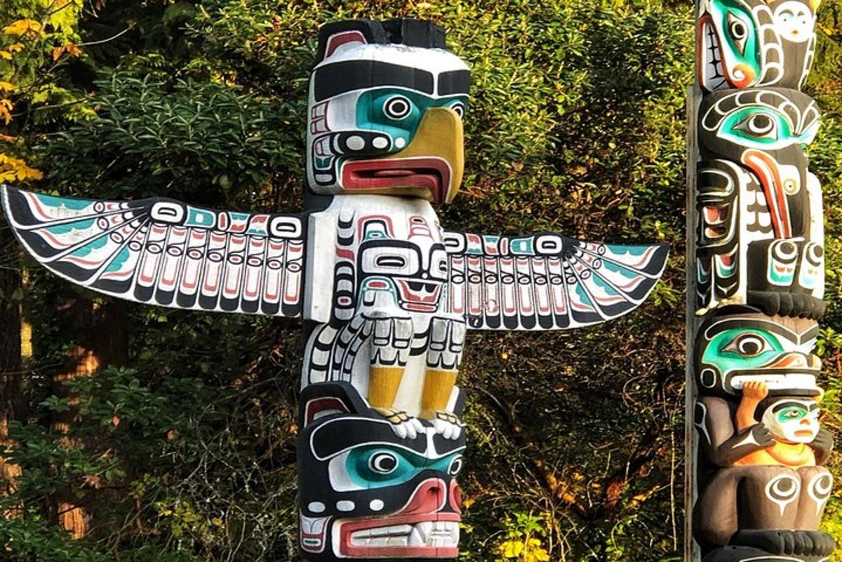 a group of totem poles standing next to each other