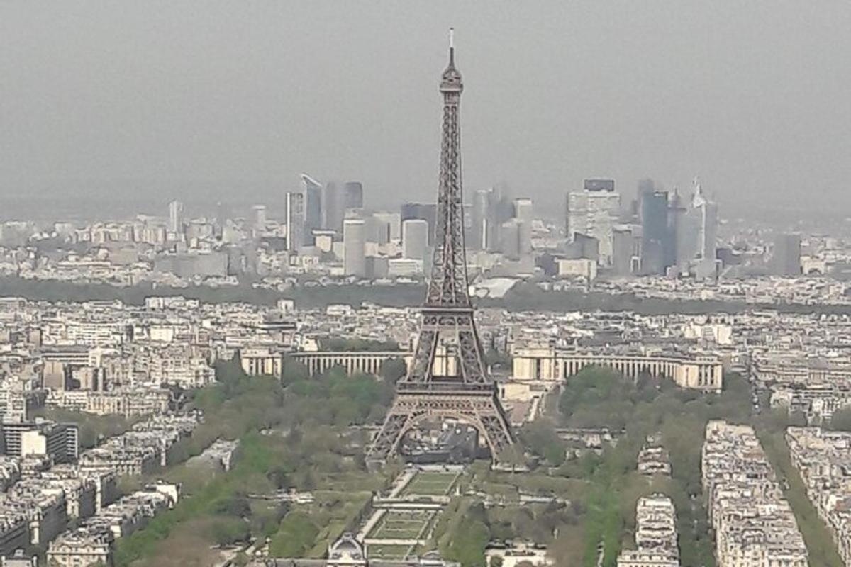 an aerial view of the eiffel tower in front of a city