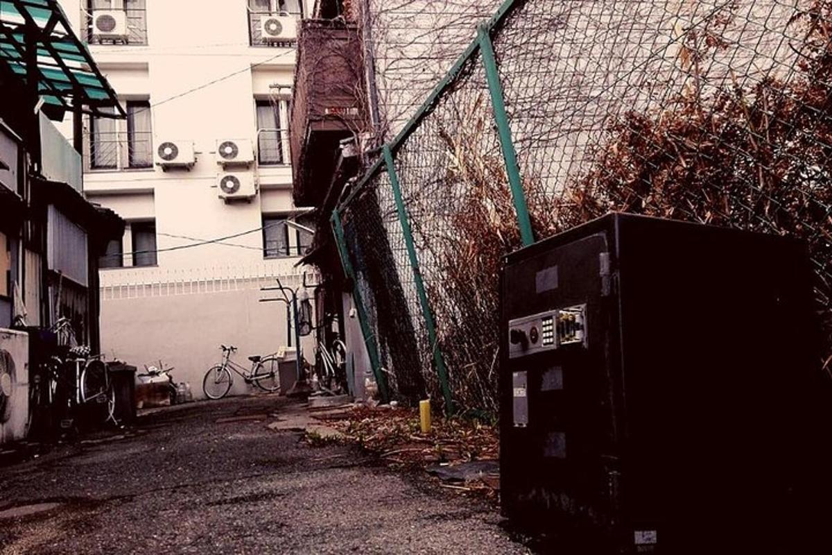 an old appliance sitting on the side of a street