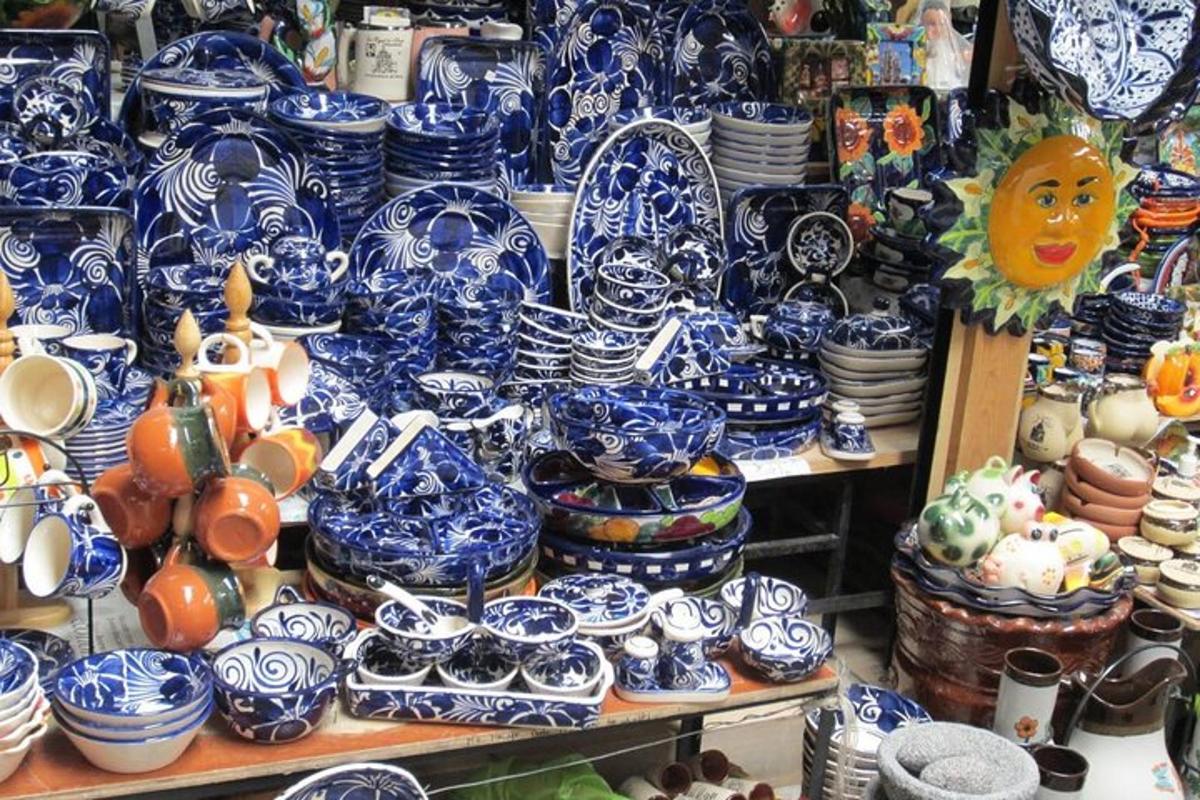 a display of blue and white ceramics in a store