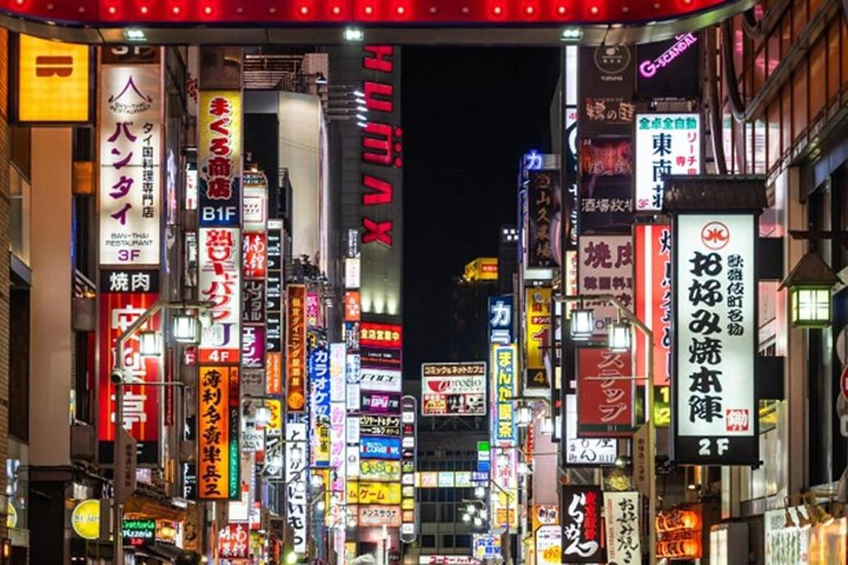 a crowd of signs in a city at night