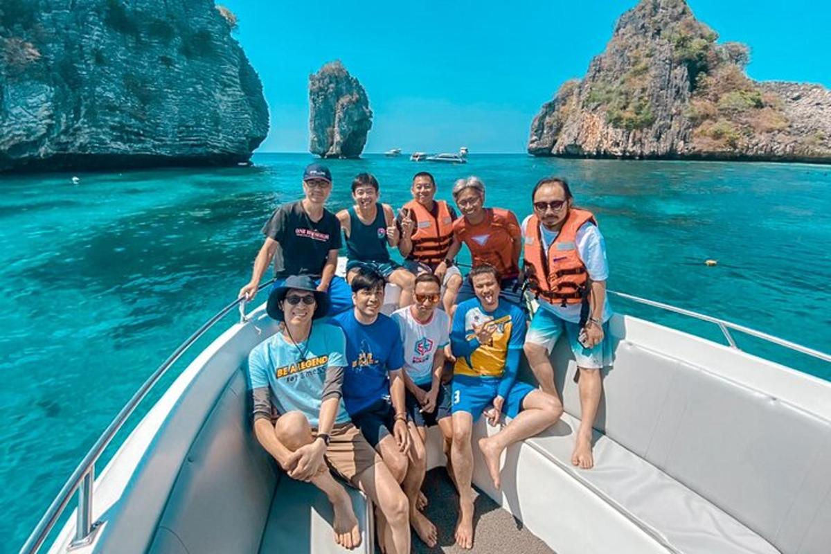 a group of people on a boat in the ocean