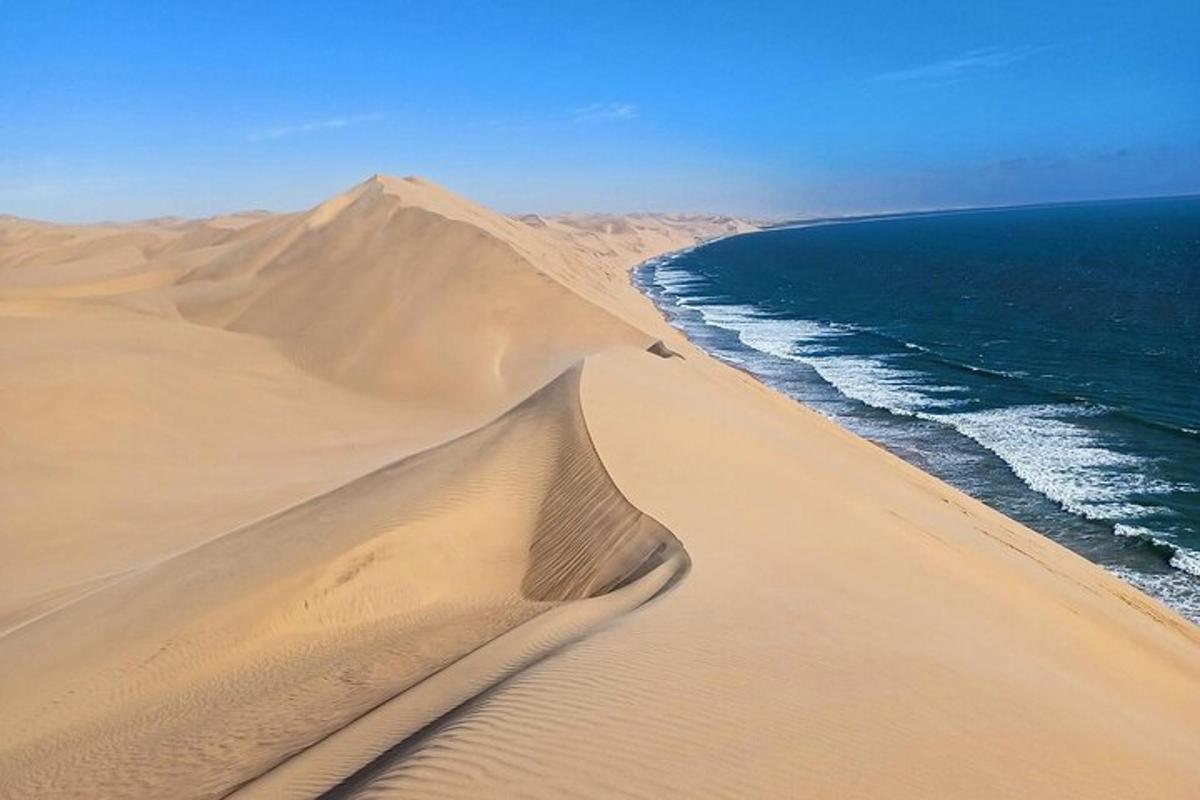 an aerial view of the desert and the ocean