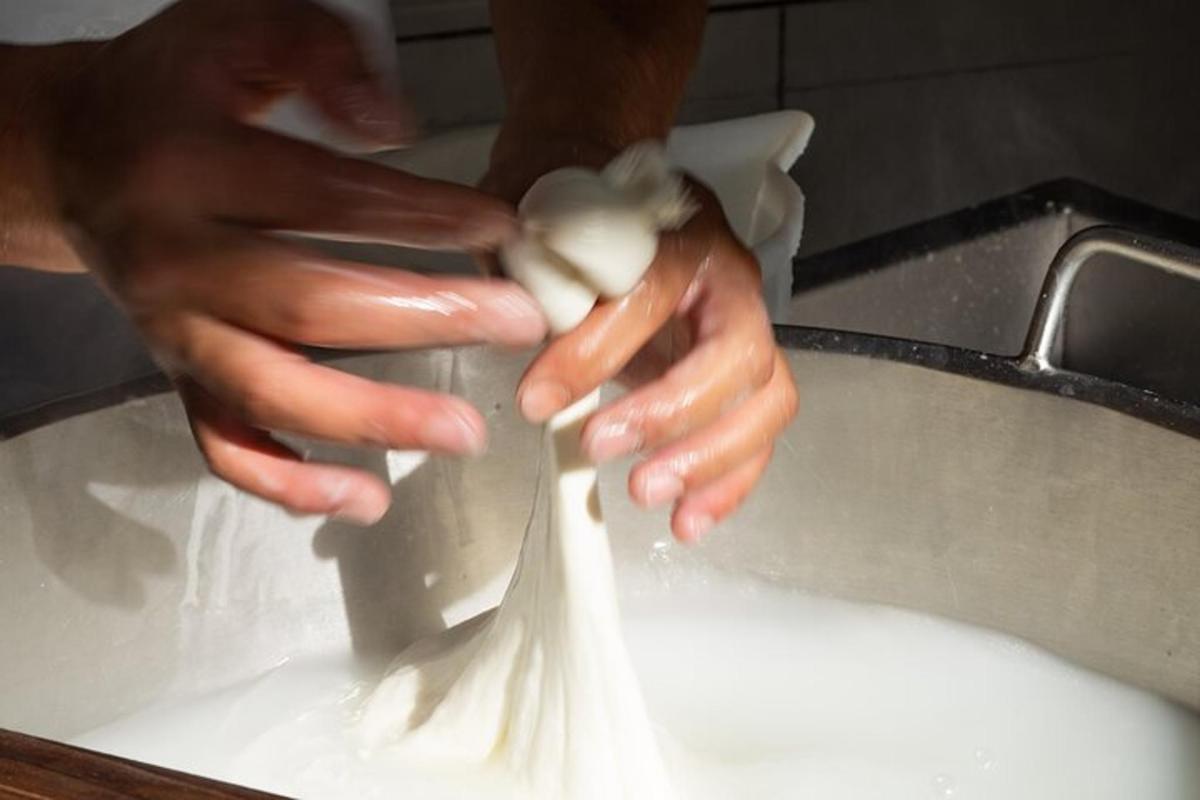 a person is washing a rag in a sink