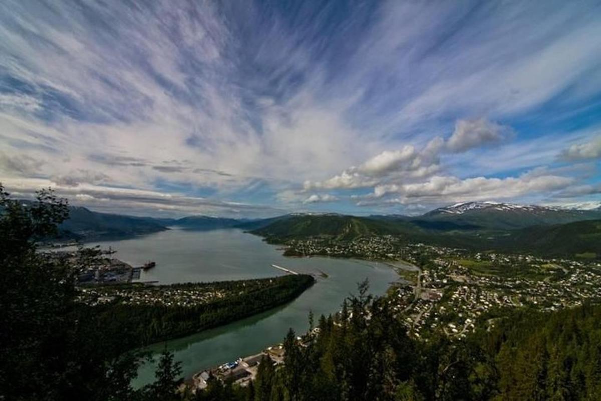 a view of a river with a town and a city