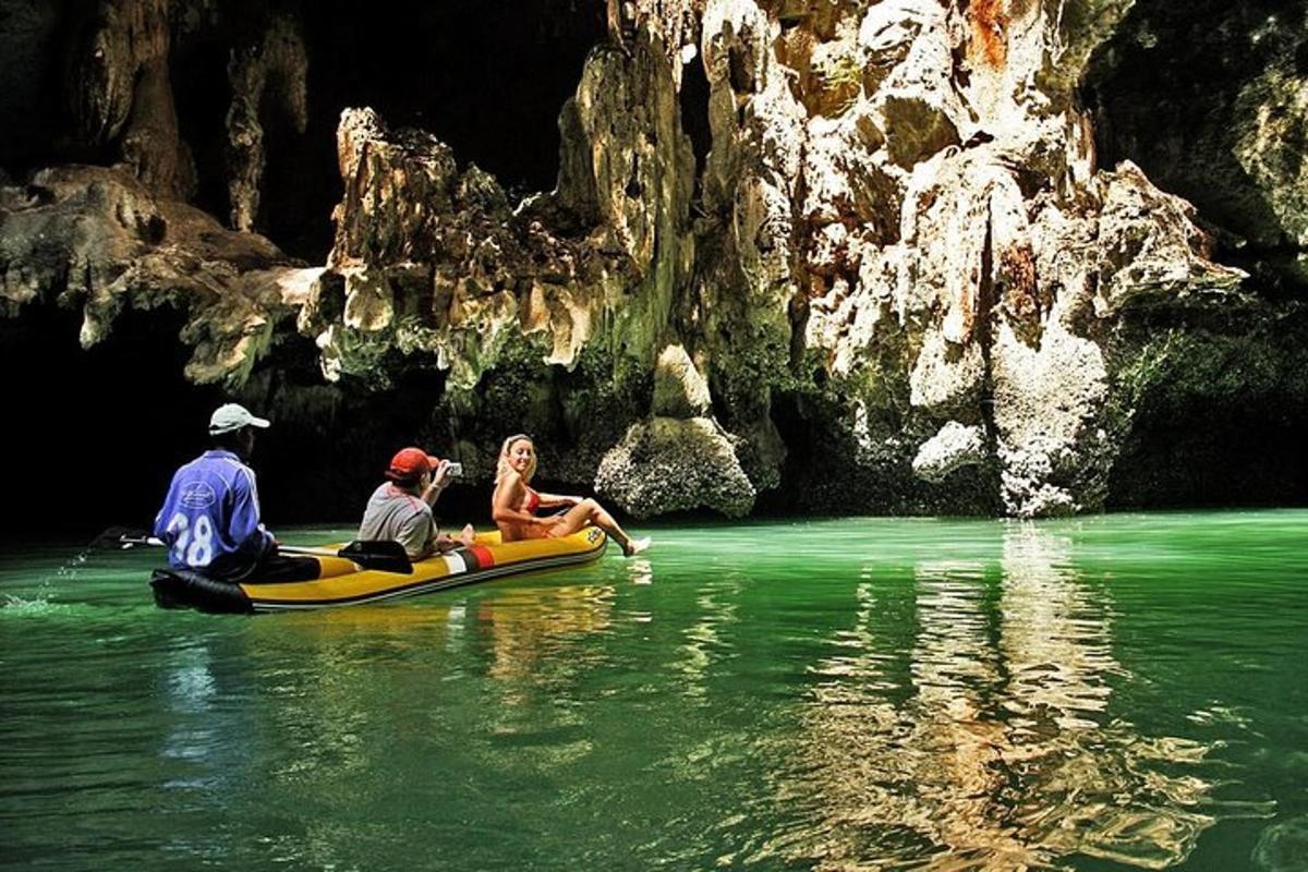 a group of people riding on a raft in the water