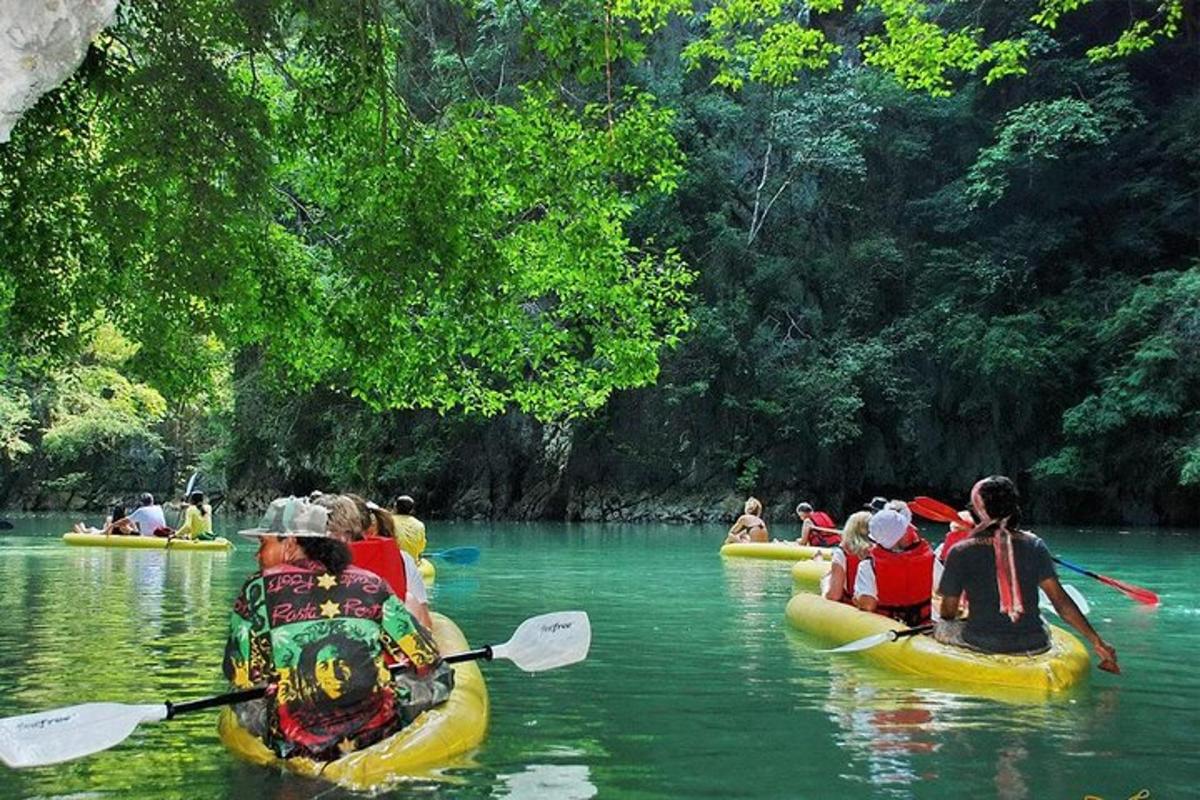 a group of people are kayaking down a river