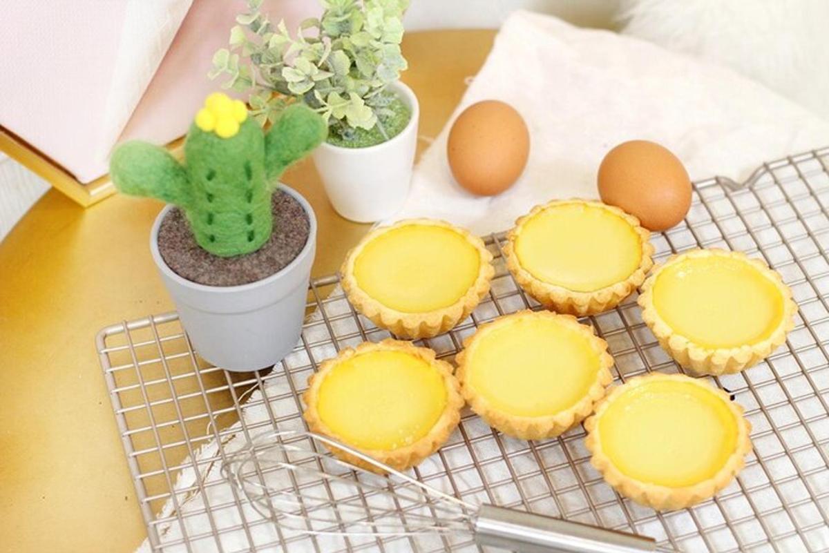 a cooling rack with eggs and a cactus and cookies