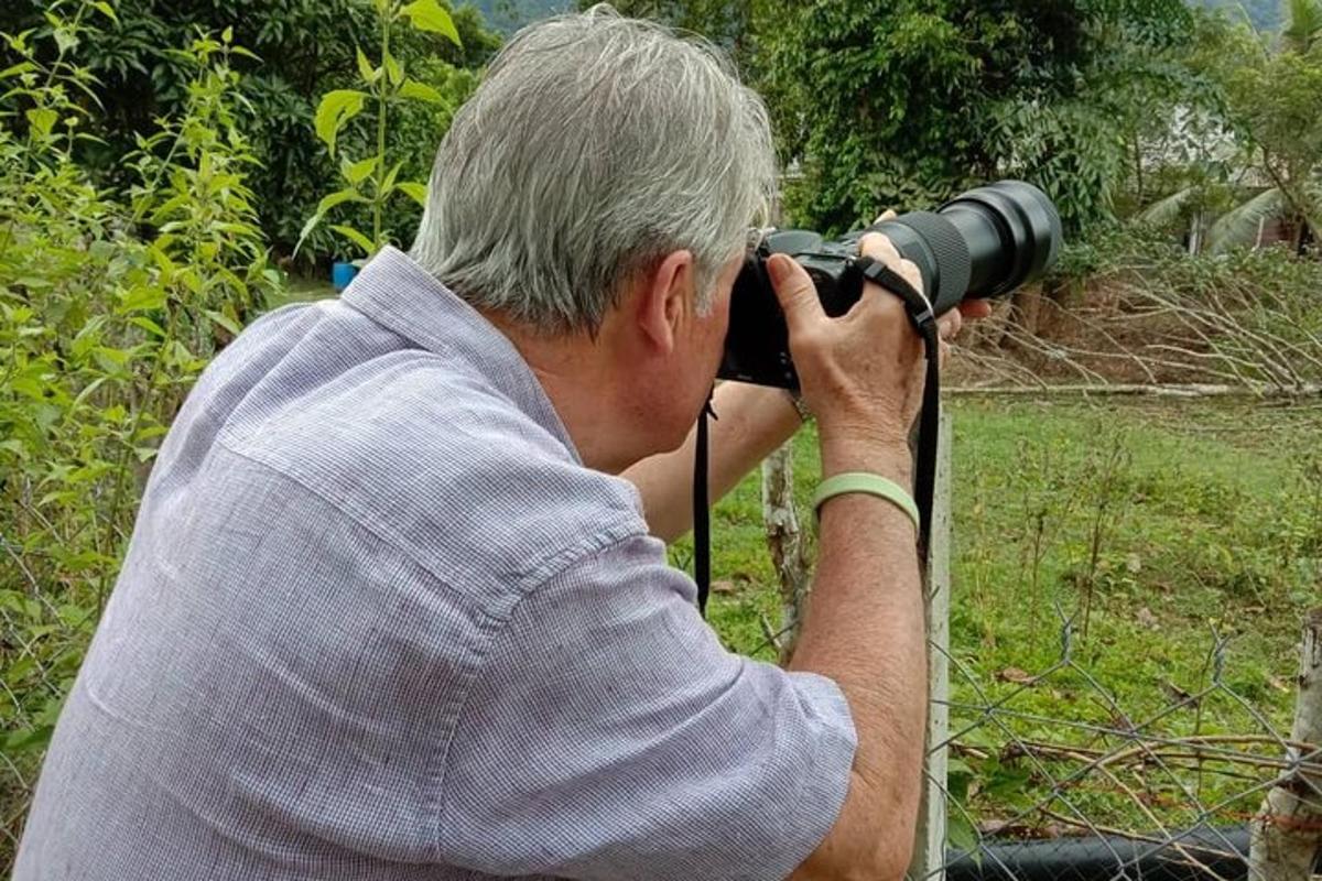 a man is taking a picture with a camera