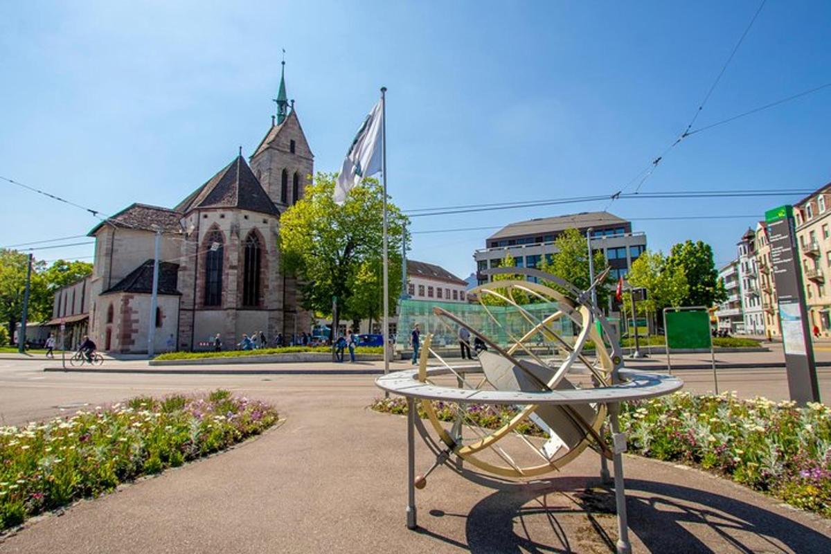 a bench in front of a building with a church