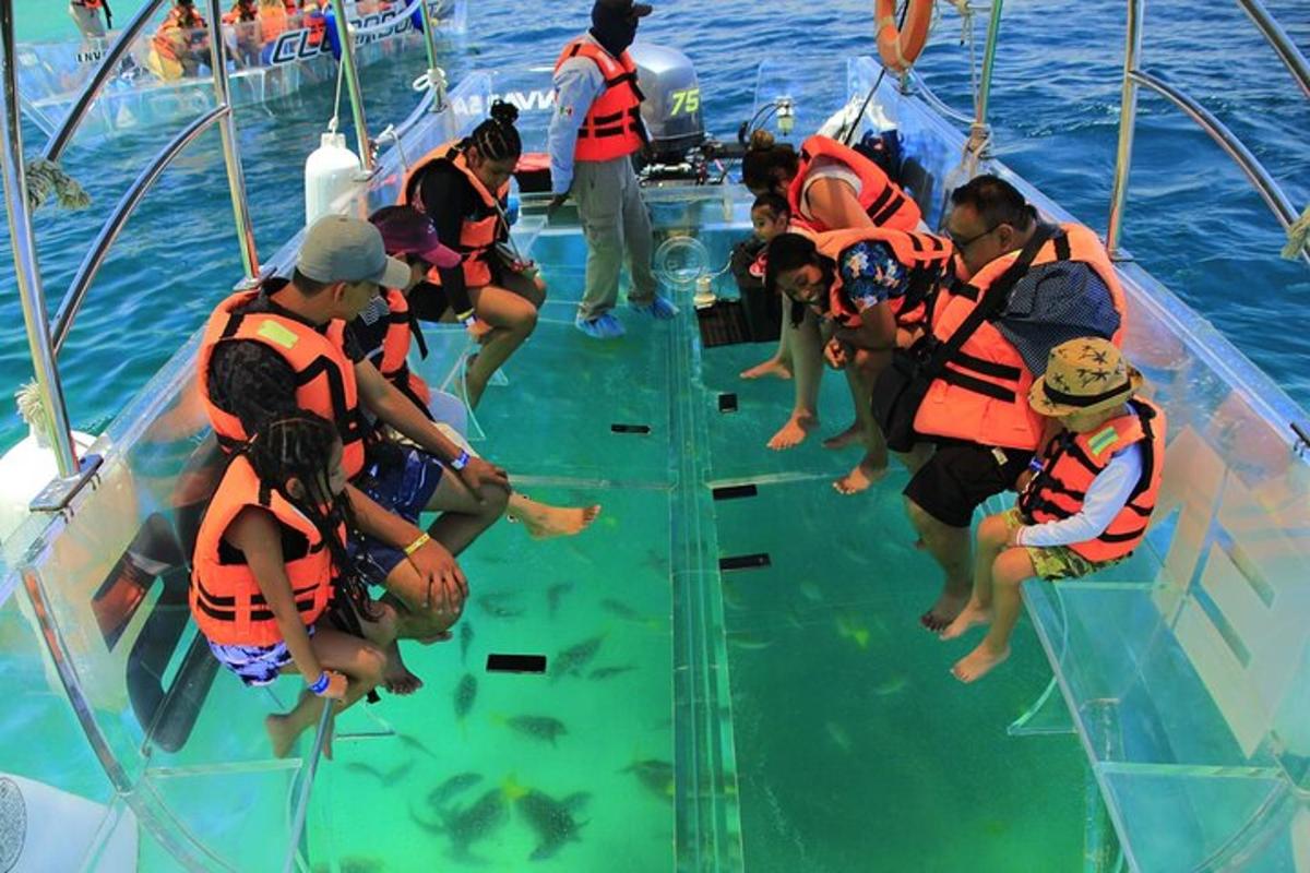 a group of people on a boat in the water