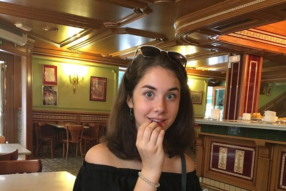 a woman brushing her teeth in a restaurant