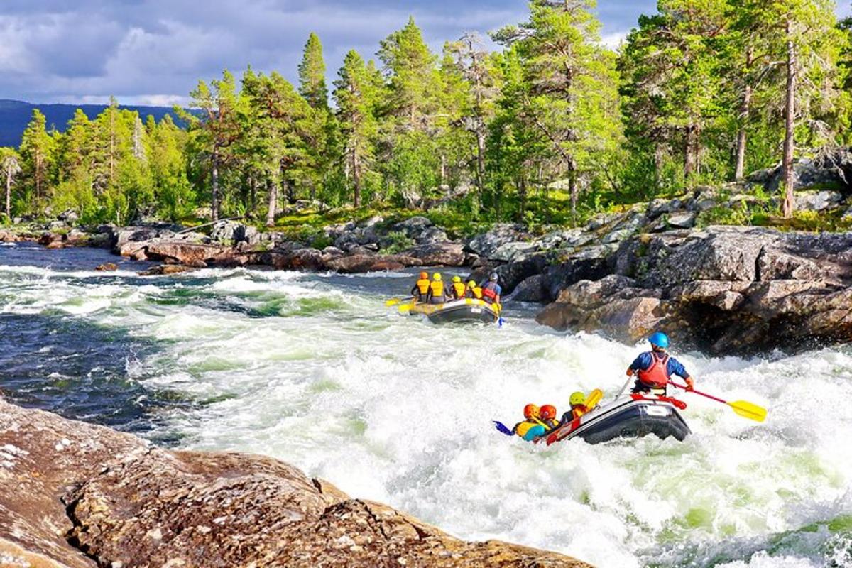 a group of people are rafting on a river