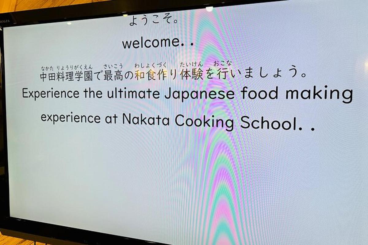 a computer screen with a sign that reads experience the ultimate impedance food making experience