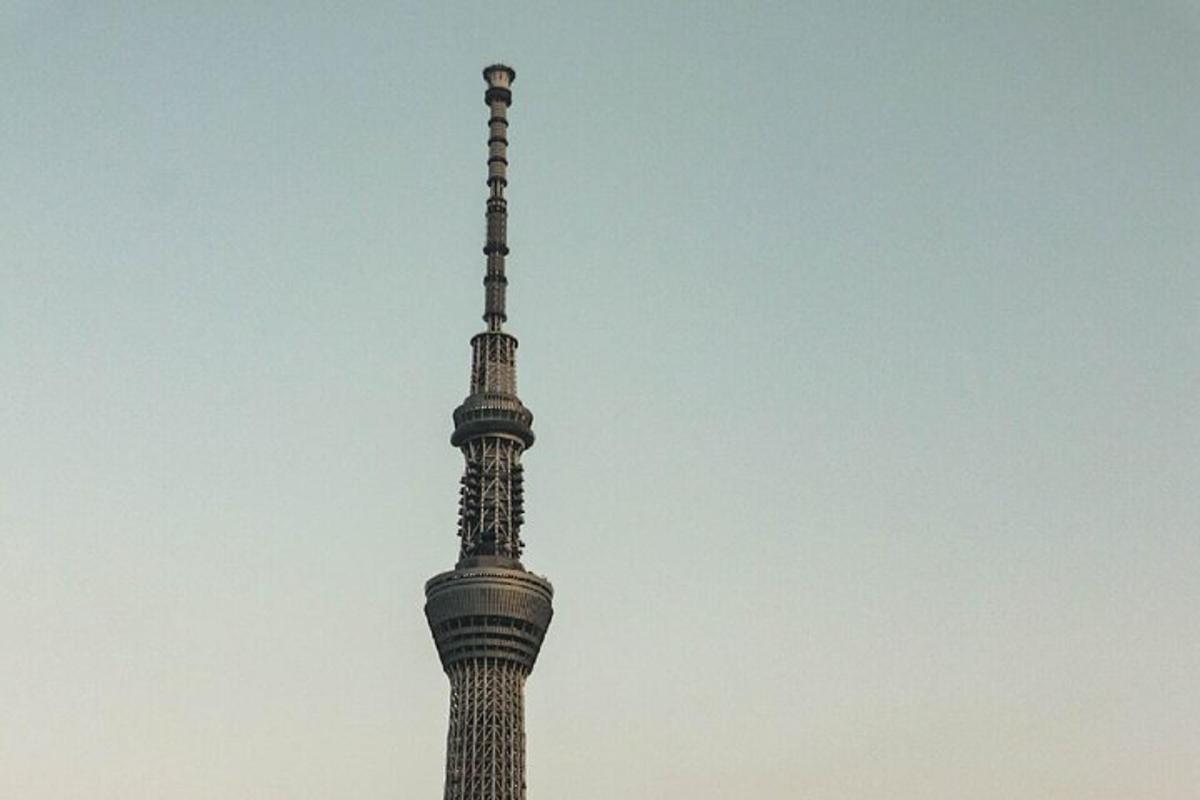 a tall tower in the sky with a sky