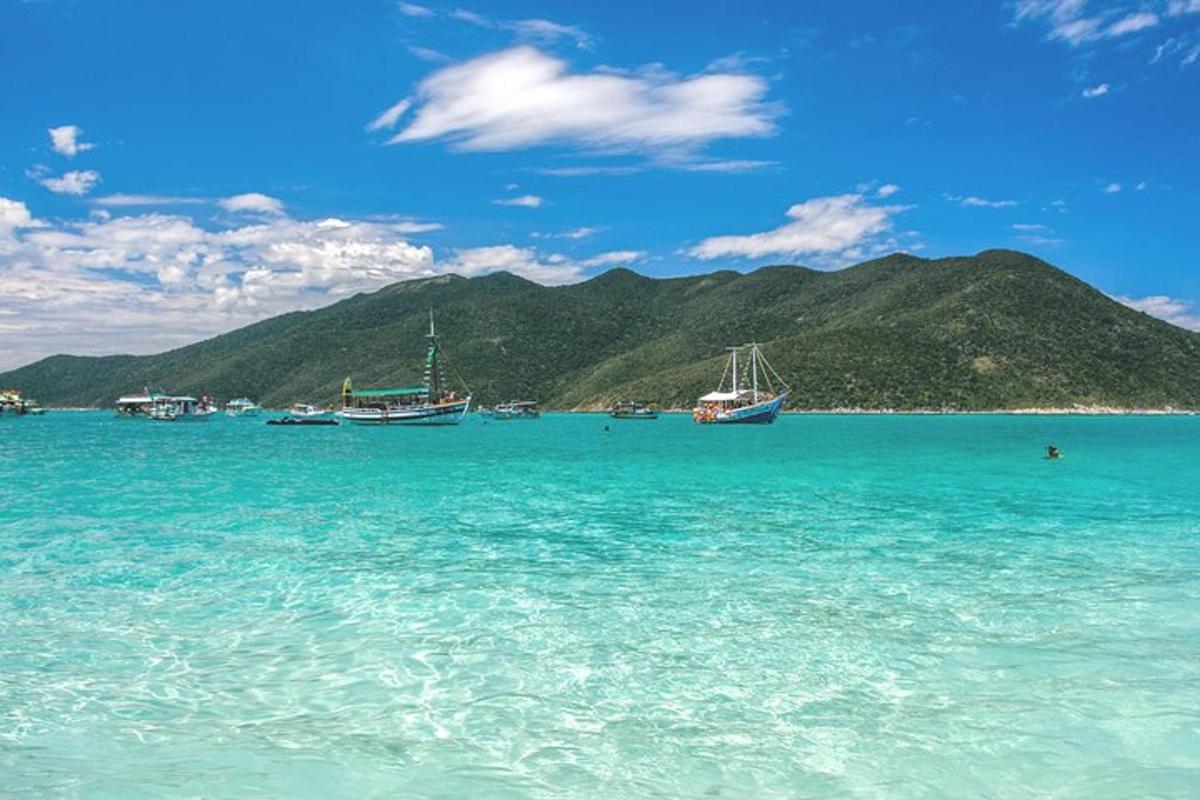 a view of a beach with boats in the water