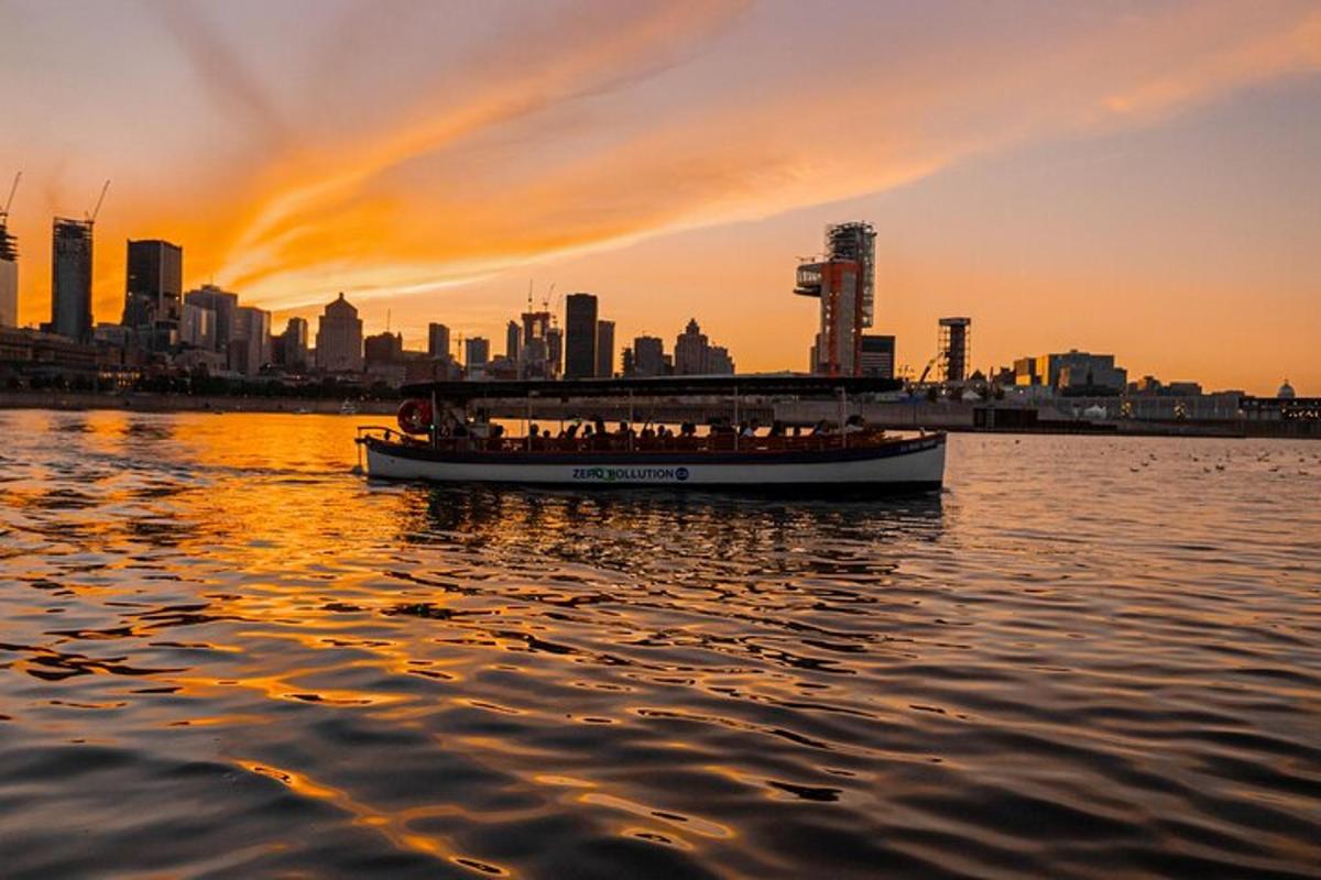 a boat in the water with a city in the background