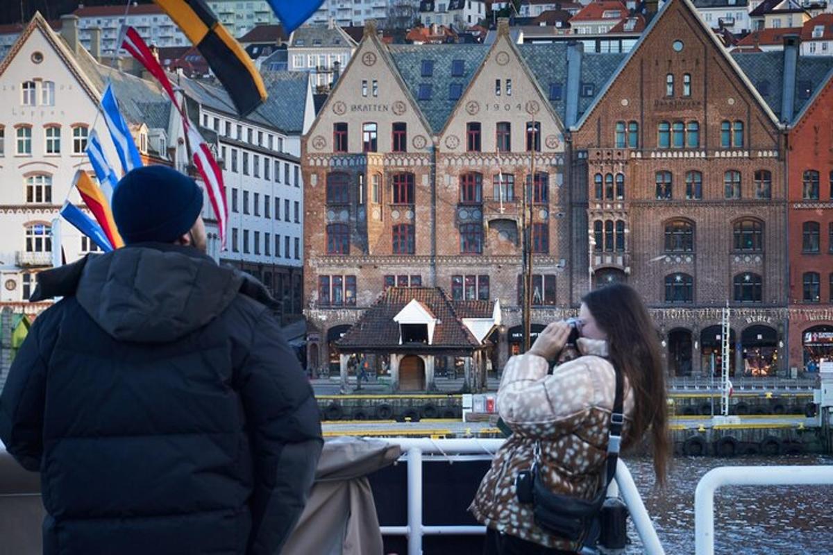 a man and a woman taking a picture of a city