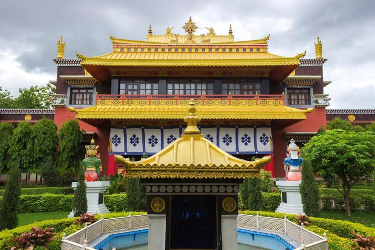 a building with a golden roof in a park