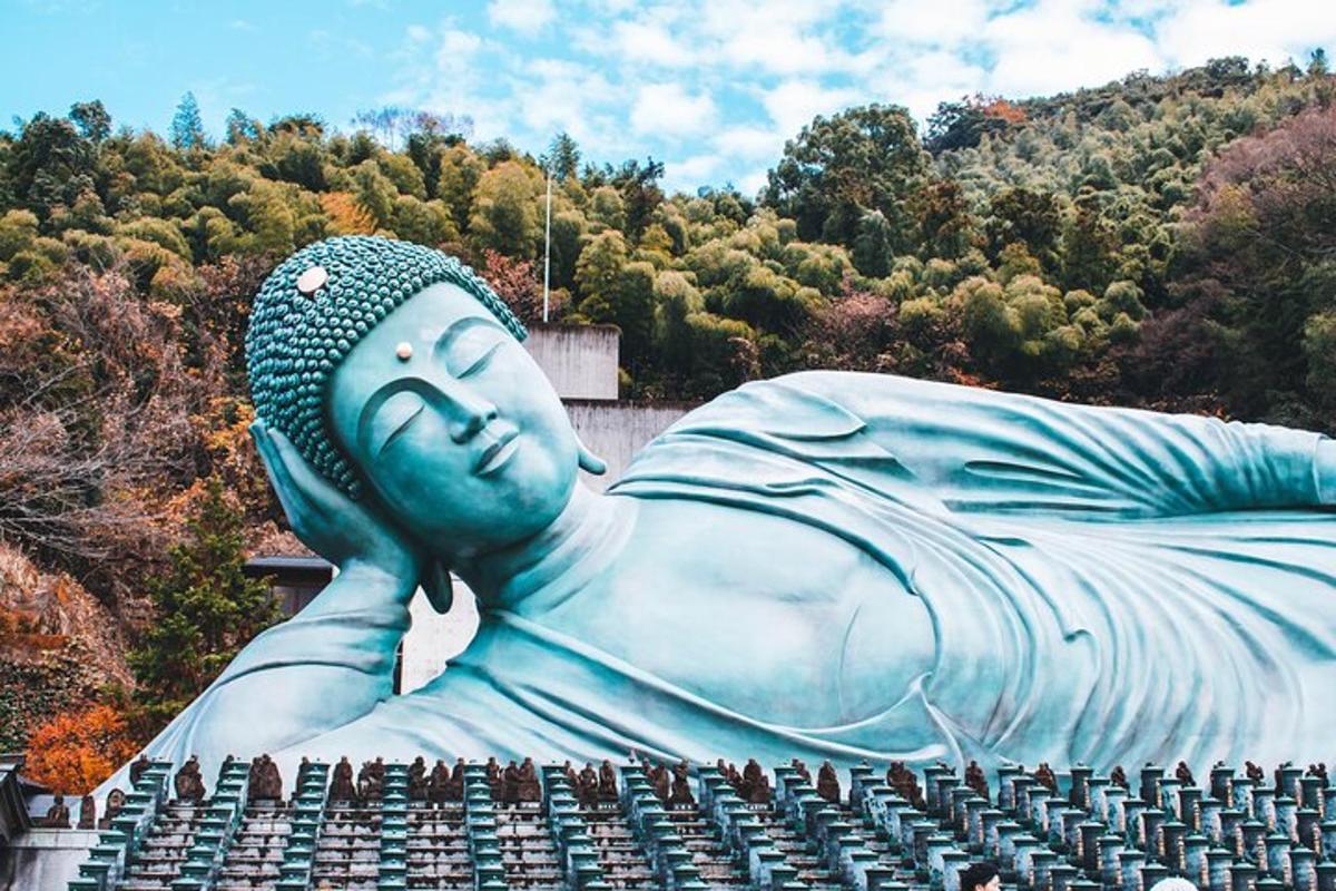 a large statue sitting on top of a building