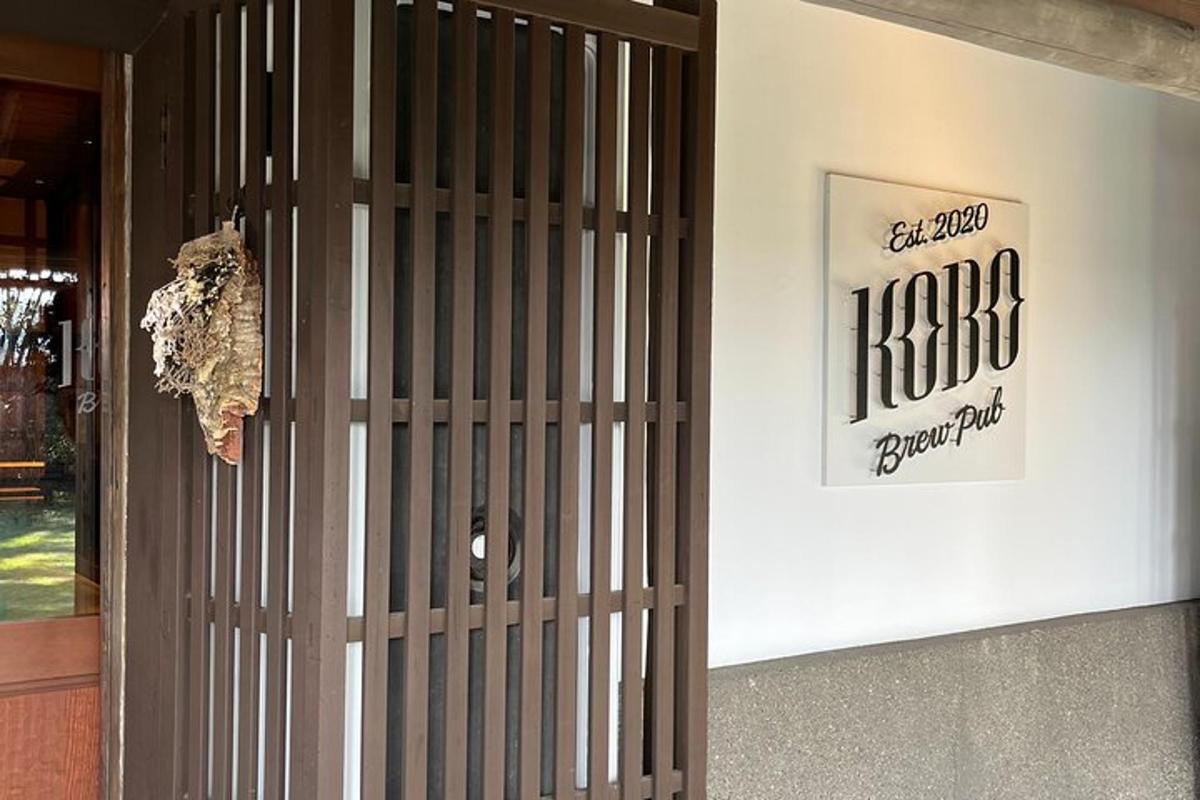 a gate in front of a building with a sign