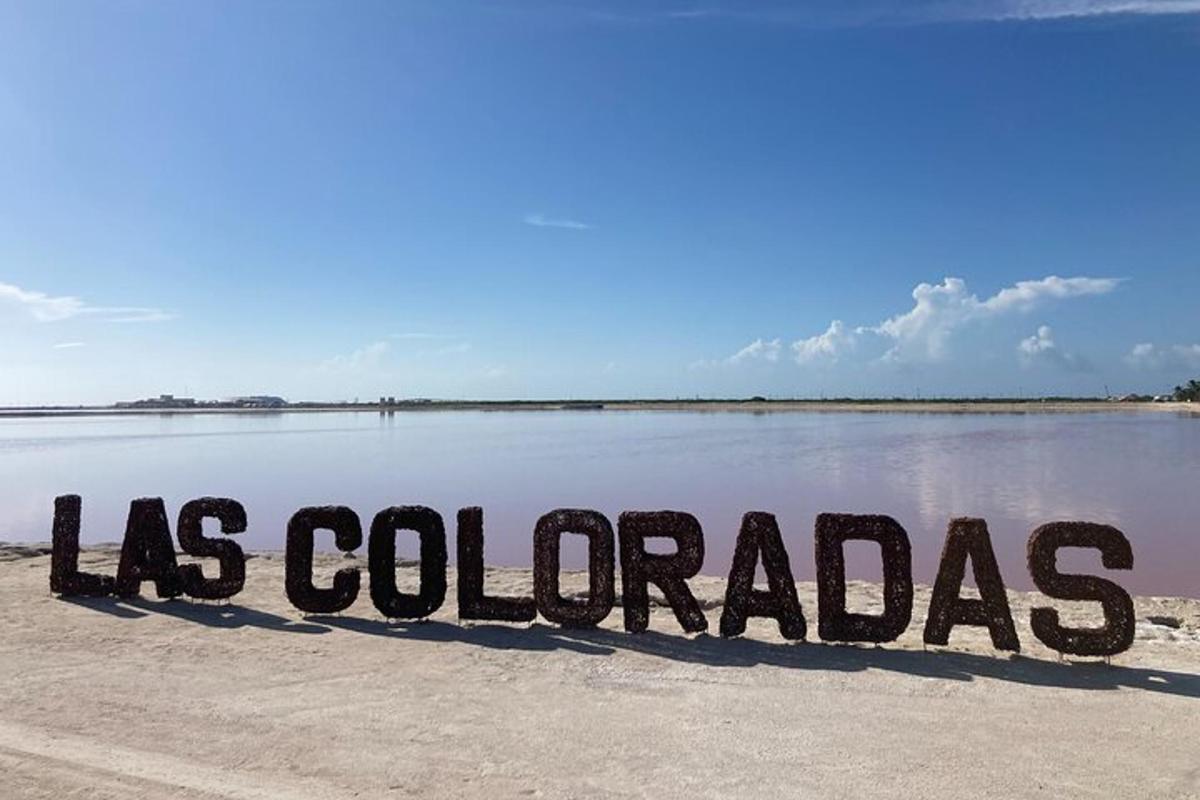 a sign that says las colombias sitting in the water