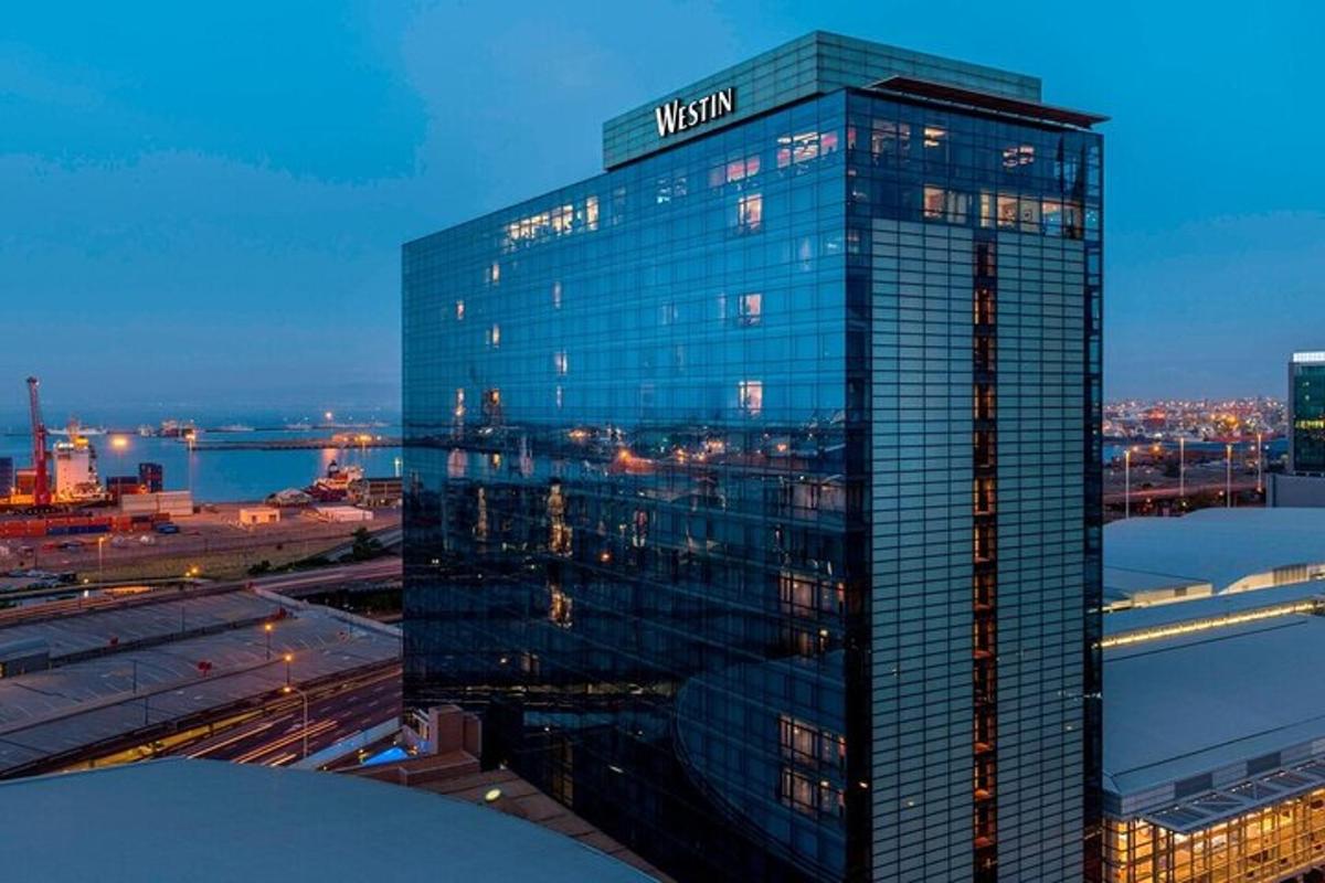 a tall building with a sign on top of it