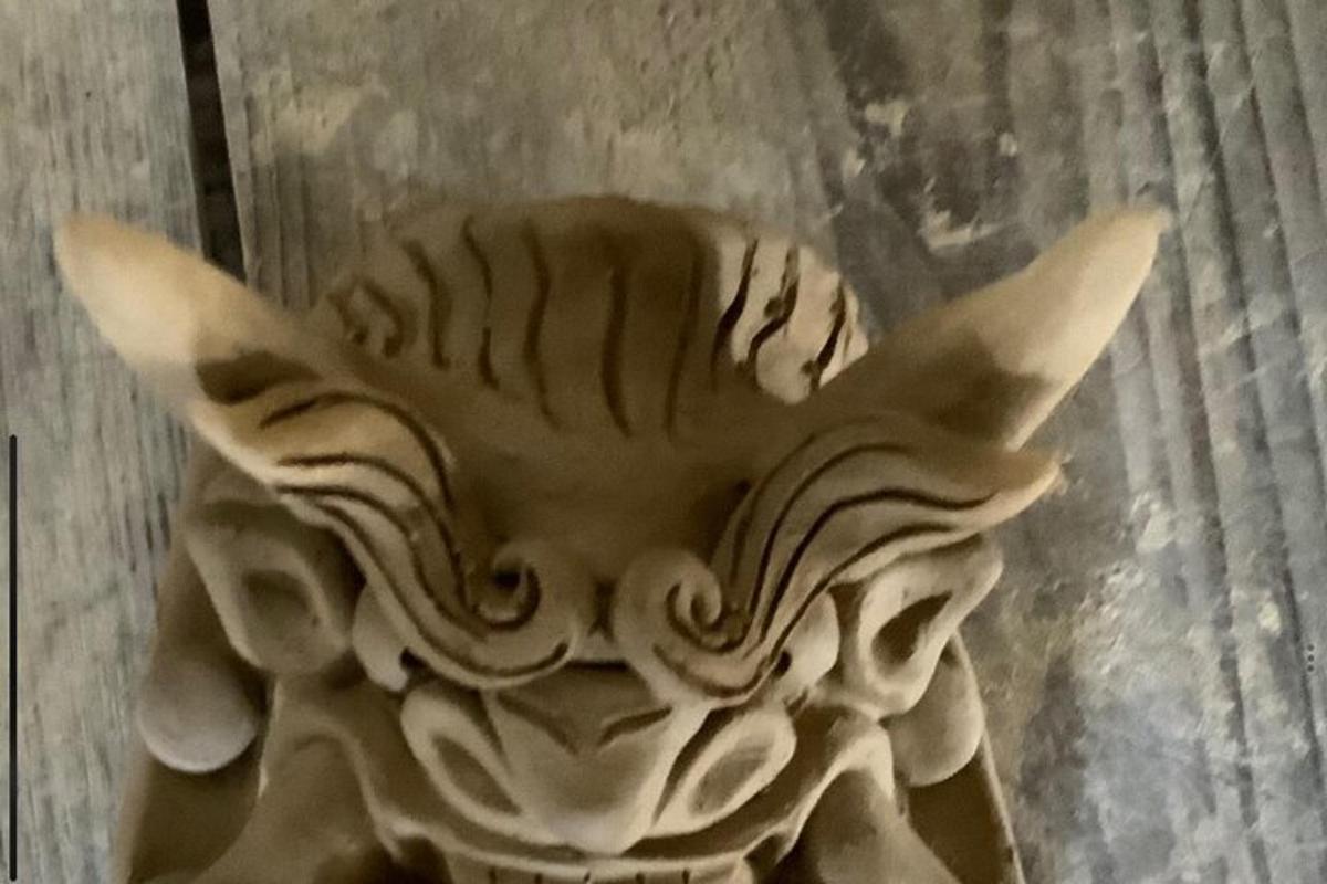 a carving of a sea shell on a table