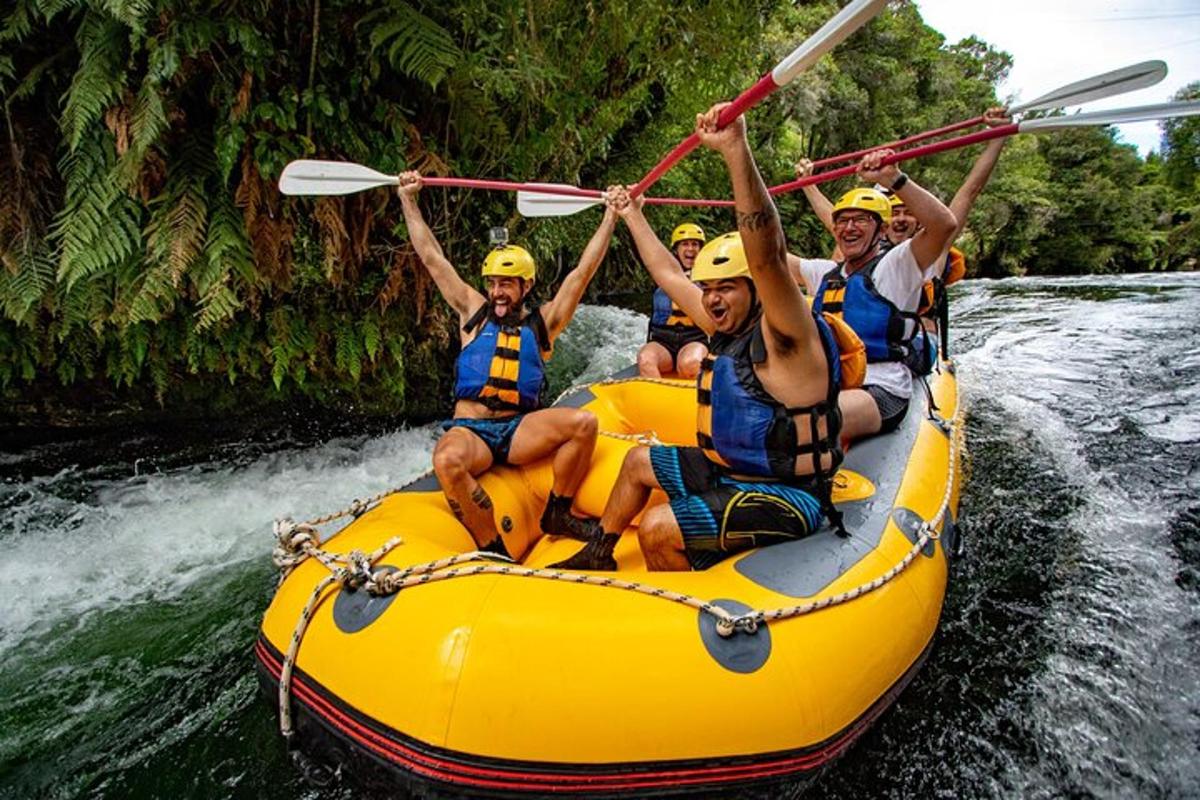 a group of people in a raft on a river