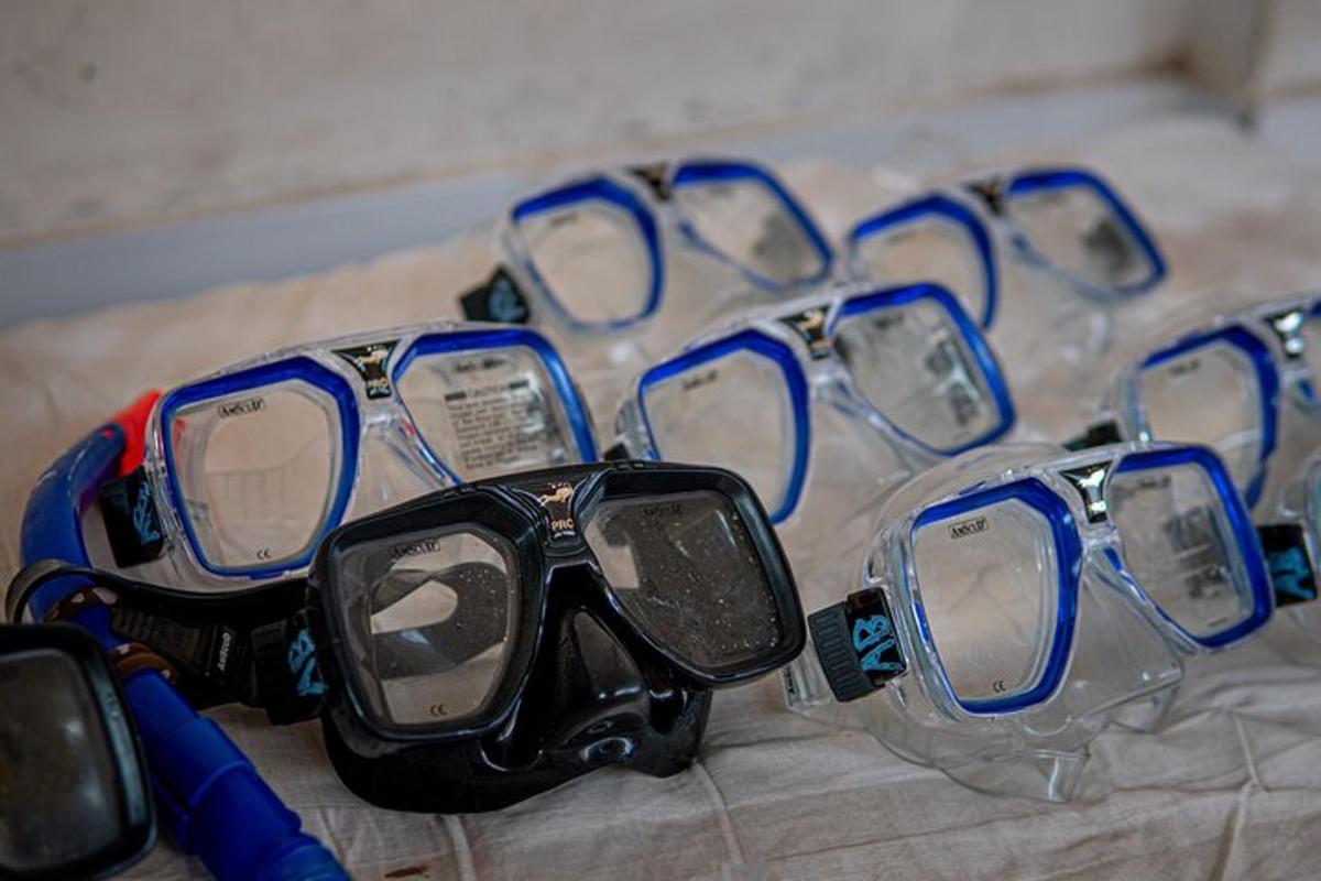 a group of sunglasses sitting on top of a table