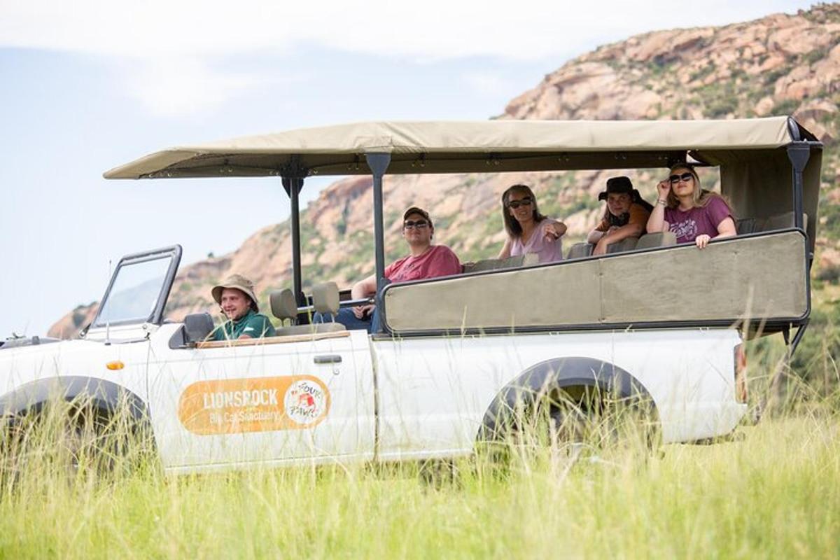 a group of people riding in a golf cart