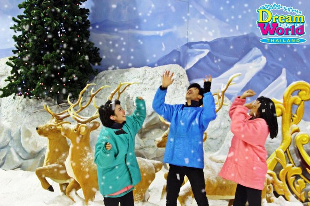 a group of people standing in front of a christmas tree