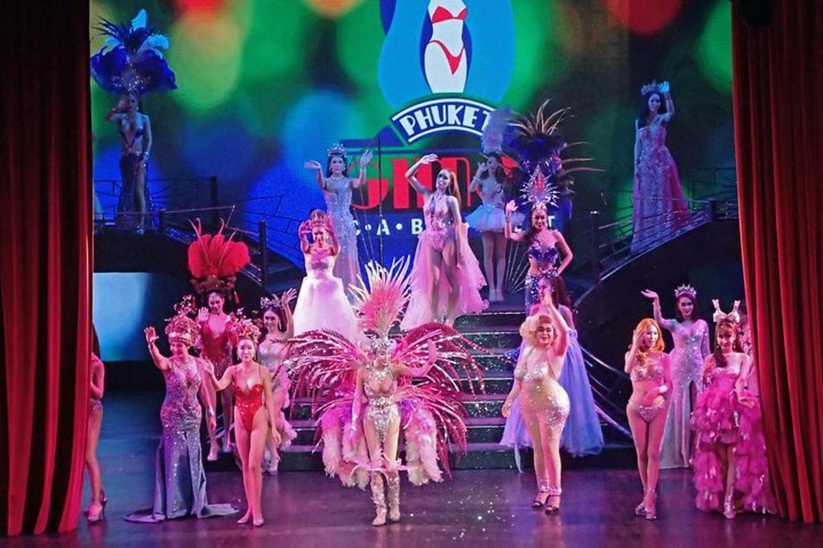a group of dancers in pink costumes on a stage