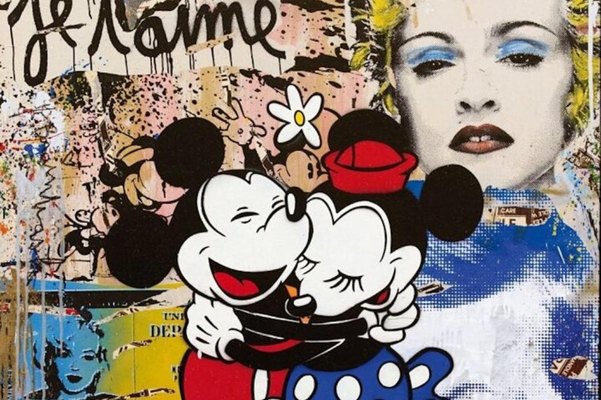 a poster of mickey mouse and a woman