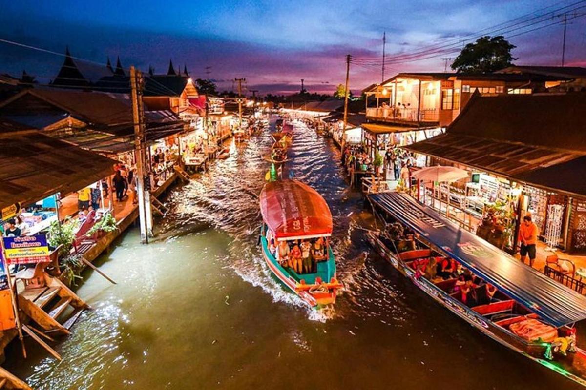 a group of boats are docked in a river