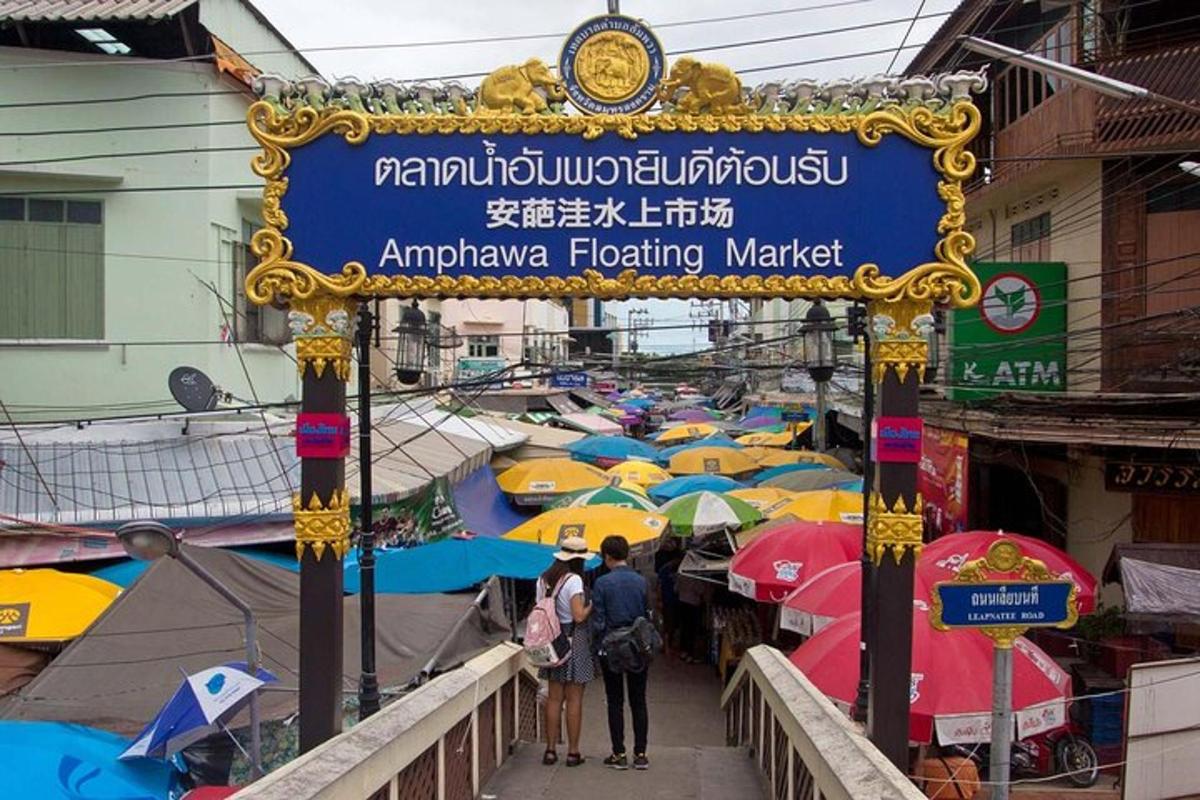 a sign for anarma fighting market with umbrellas