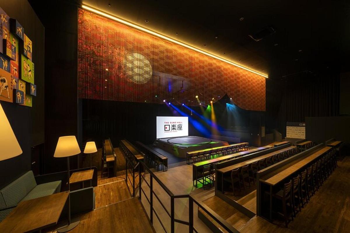 a room with chairs and a stage in a theater