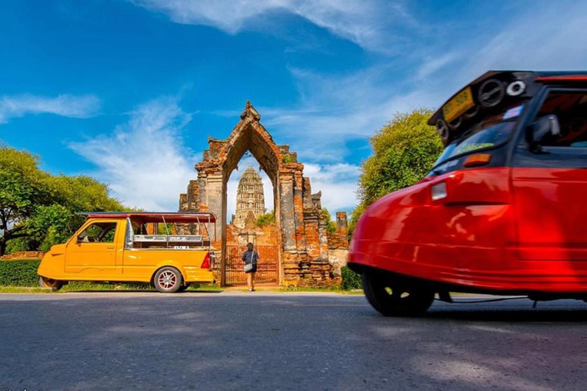a yellow van parked in front of a building