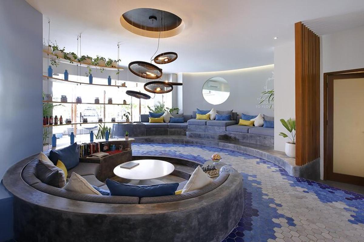 a living room with a large couch and a table