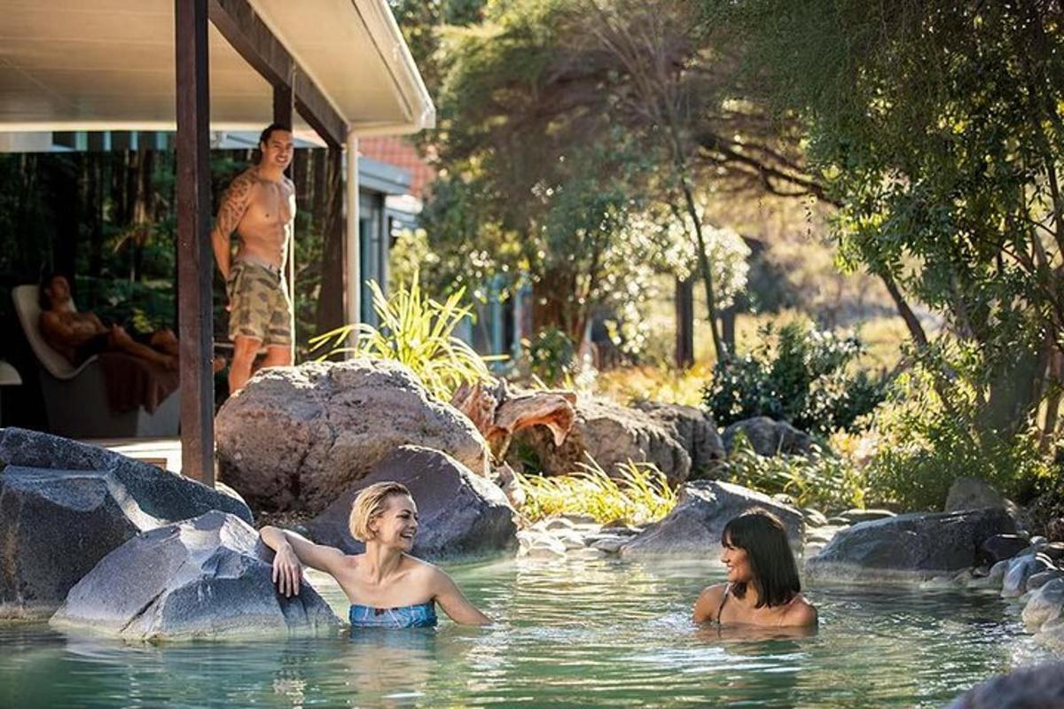 two women in the water in a swimming pool