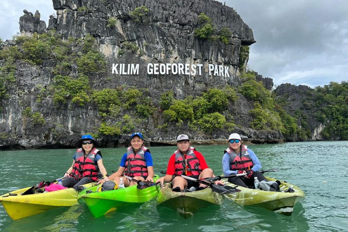 a group of people sitting on kayaks in the water