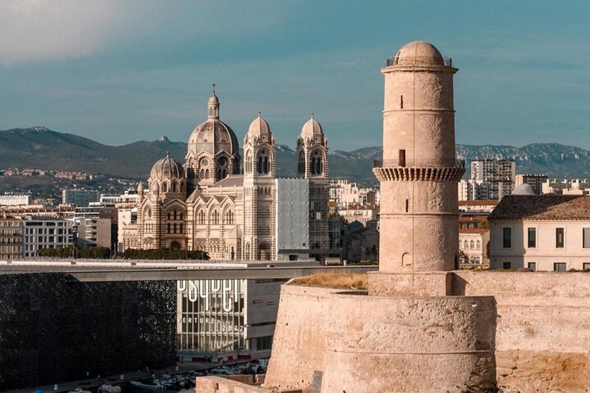 a view of a city with two towers and buildings