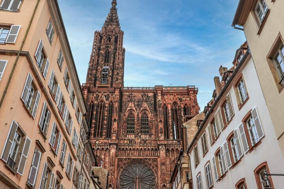 a large church with a tall tower in a city