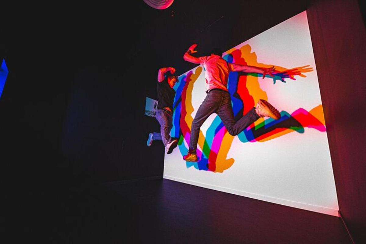 a man doing a trick on a skateboard on a wall