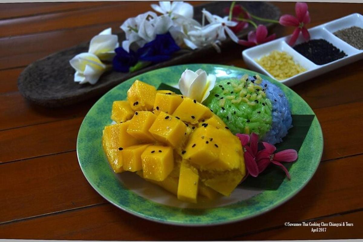 a green plate of food on a table with flowers