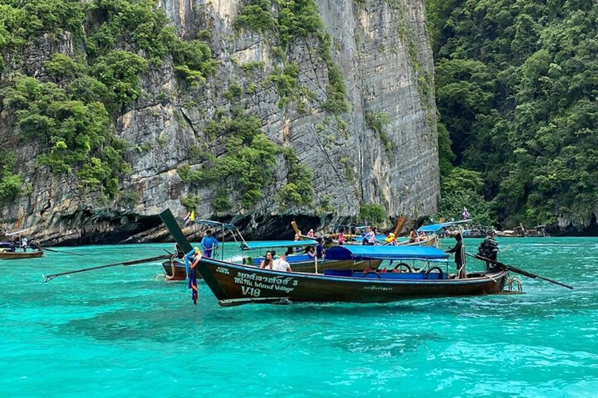 a group of people on a boat in the water